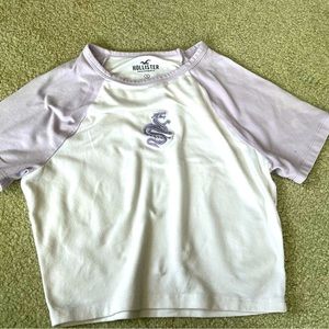 Hollister Crop baby tee with dragon design on the front with tie dye sleeves